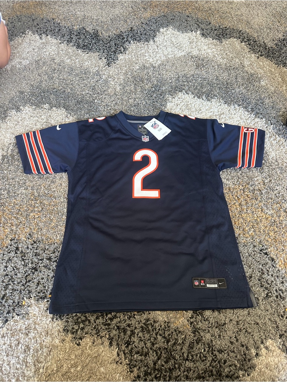 Nike Kids Navy Blue Football Jersey with Orange & White Accents